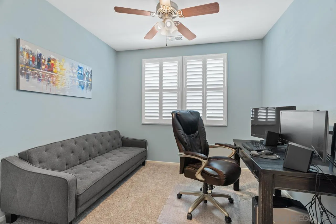 9811 Old Tree Lane Santee, CA 92071 - Photo 24 of 45 a view of a livingroom with workspace and a window