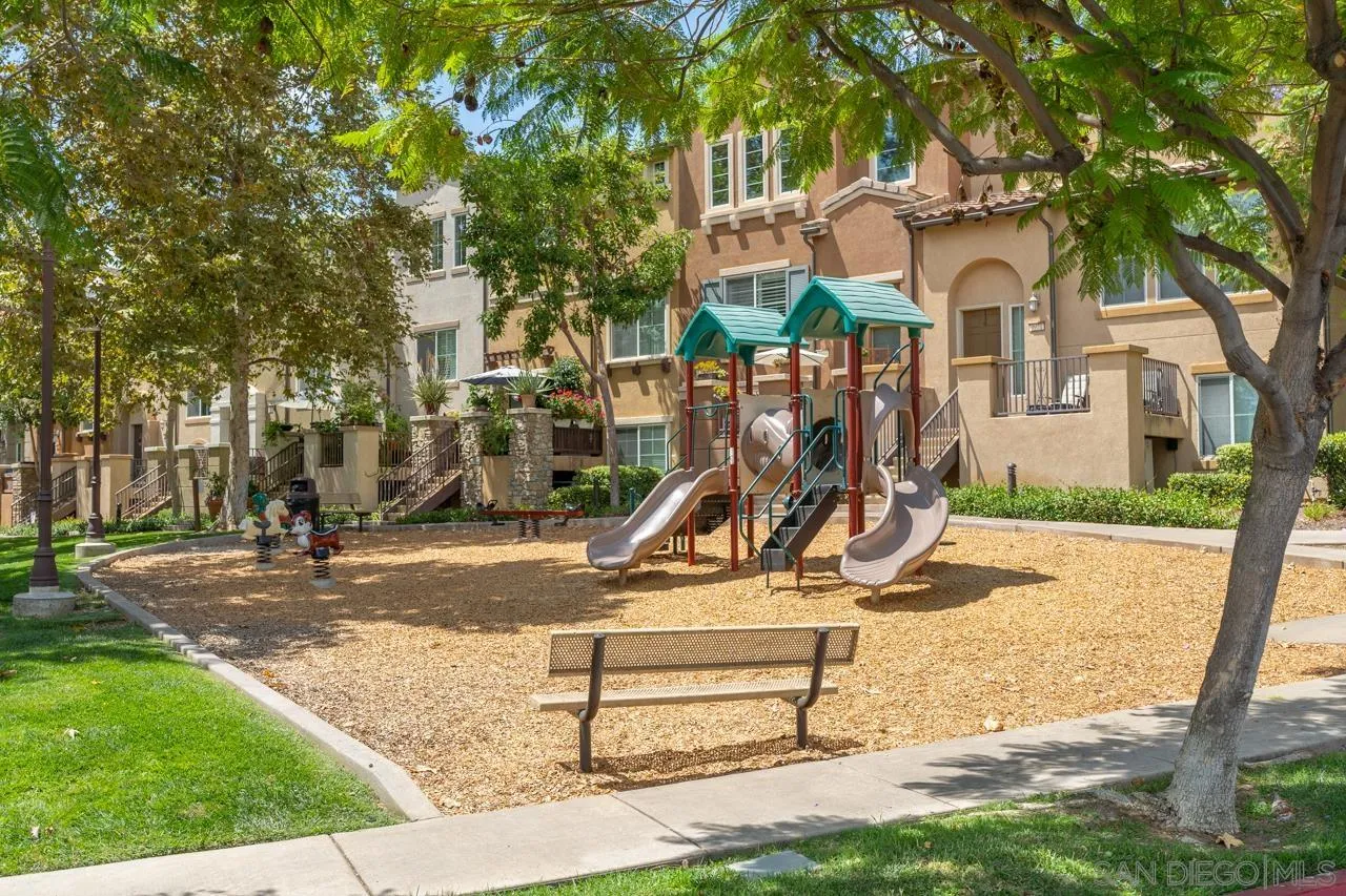 9811 Old Tree Lane Santee, CA 92071 - Photo 40 of 45 a view of a park with swings and slides