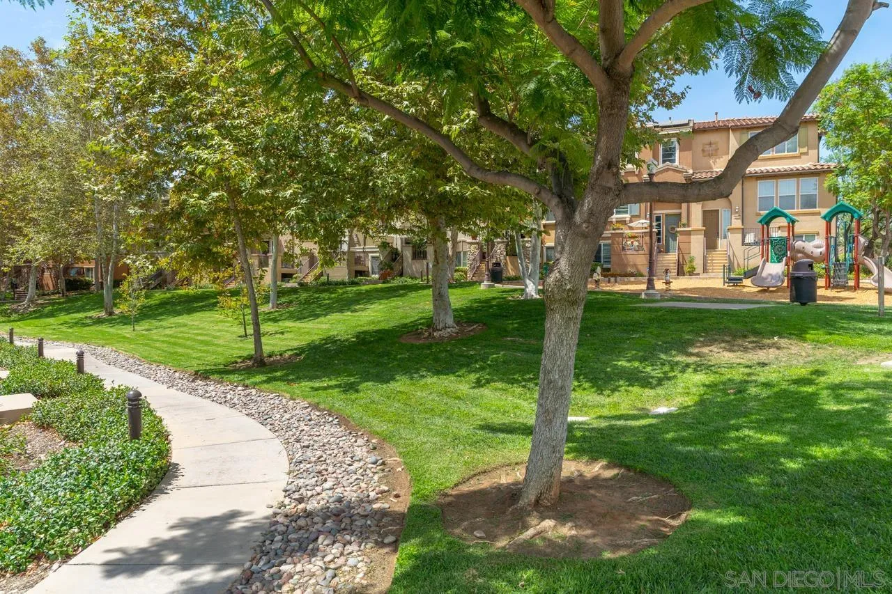 9811 Old Tree Lane Santee, CA 92071 - Photo 41 of 45 a front view of a house with a yard