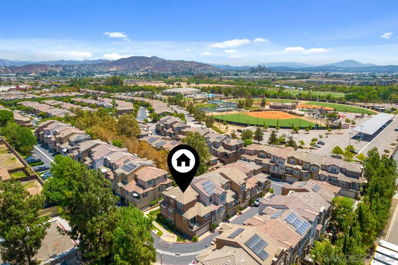 9811 Old Tree Lane Santee, CA 92071 - Photo 42 of 45 an aerial view of residential houses with outdoor space and river view