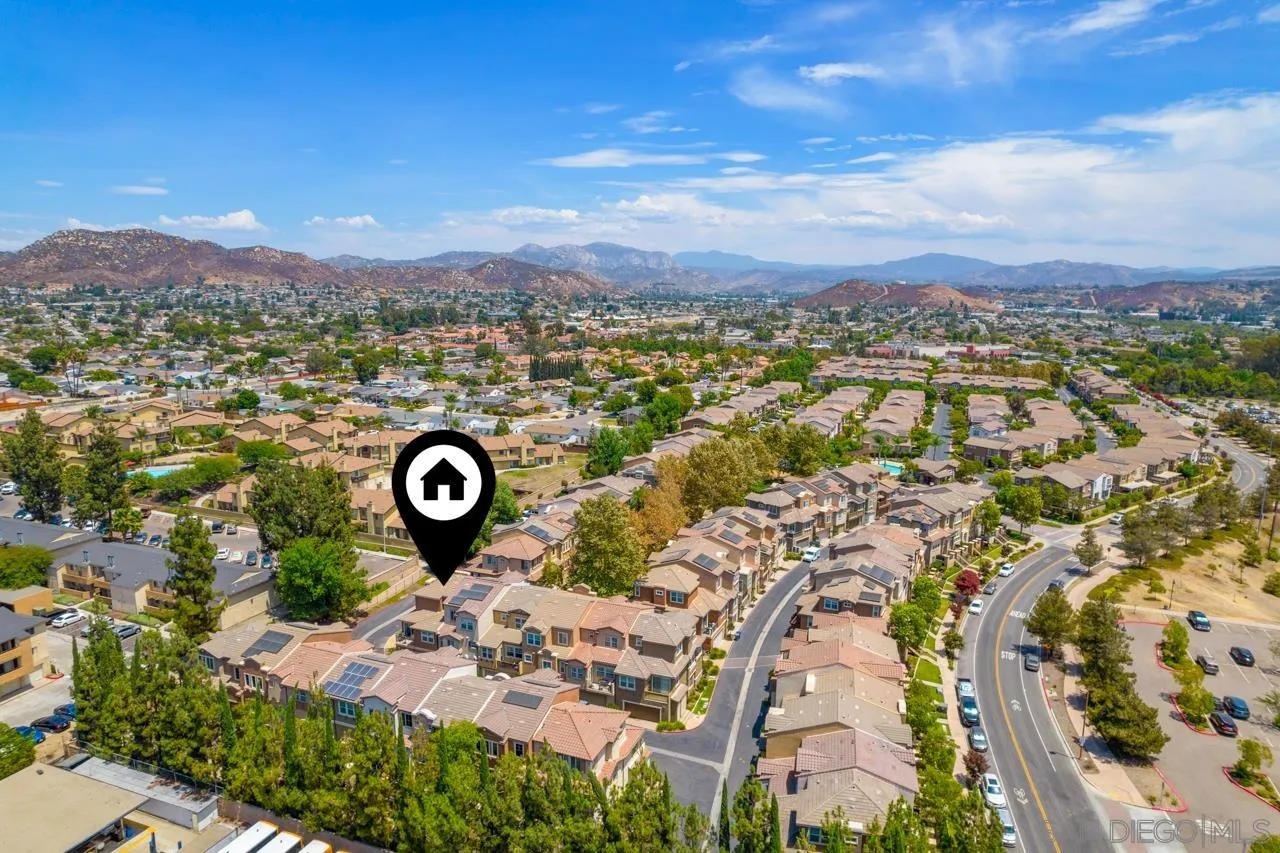 9811 Old Tree Lane Santee, CA 92071 - Photo 44 of 45 an aerial view of a house with a lake view