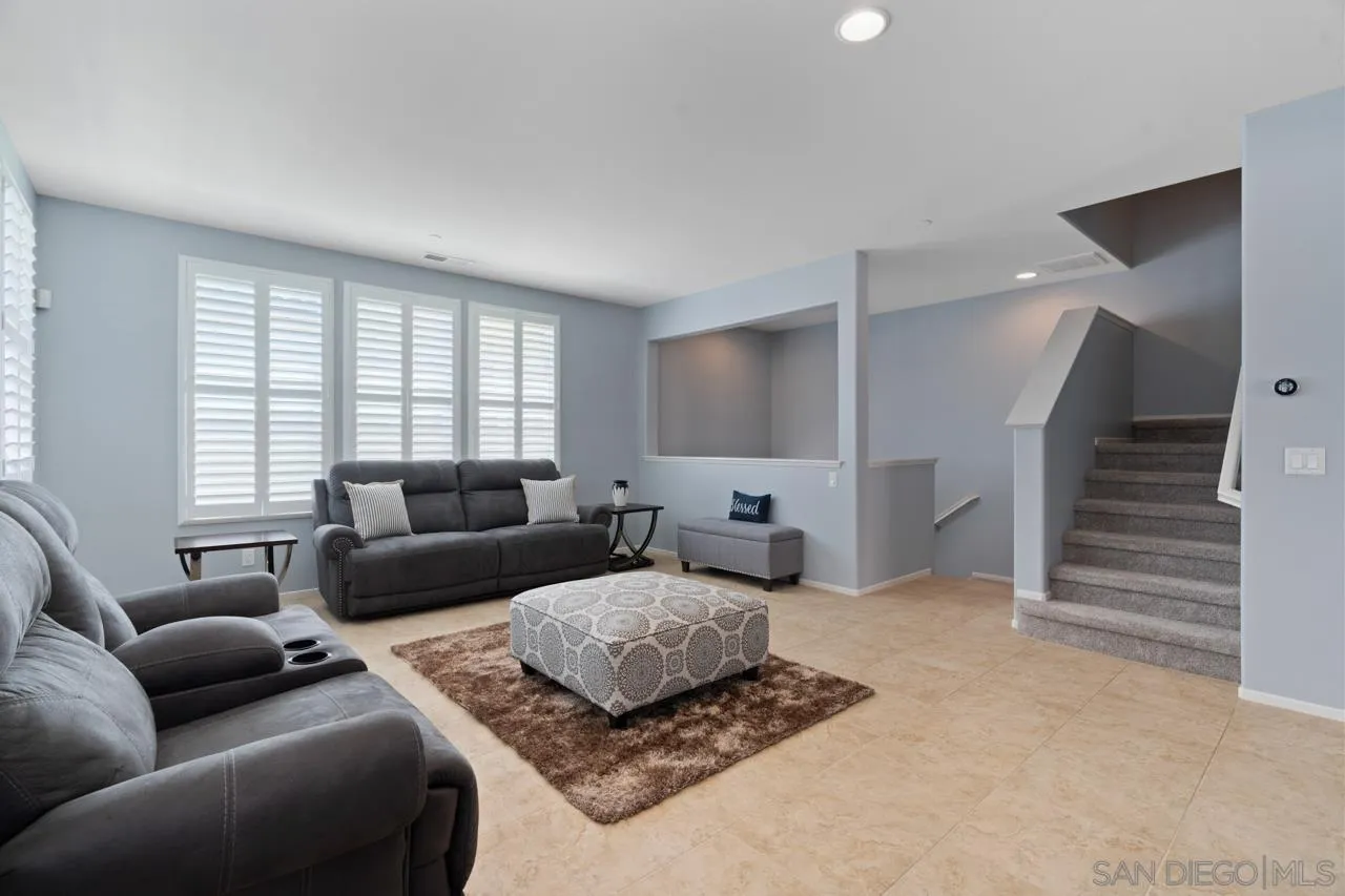 9811 Old Tree Lane Santee, CA 92071 - Photo 7 of 45 a living room with furniture and a large window