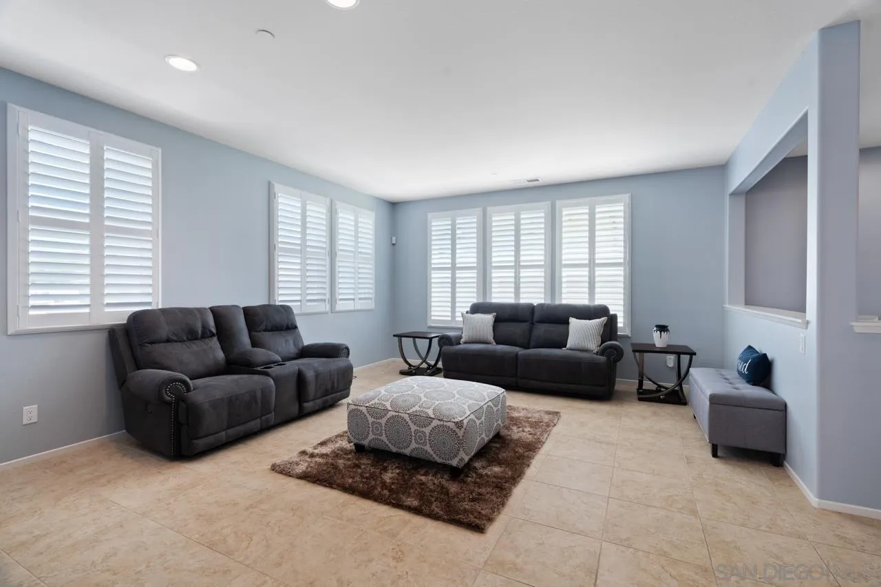 9811 Old Tree Lane Santee, CA 92071 - Photo 9 of 45 a living room with furniture and a window