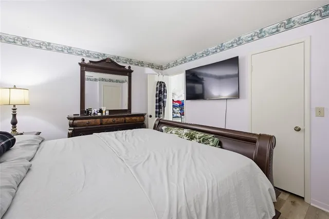a bathroom with a sink toilet and mirror