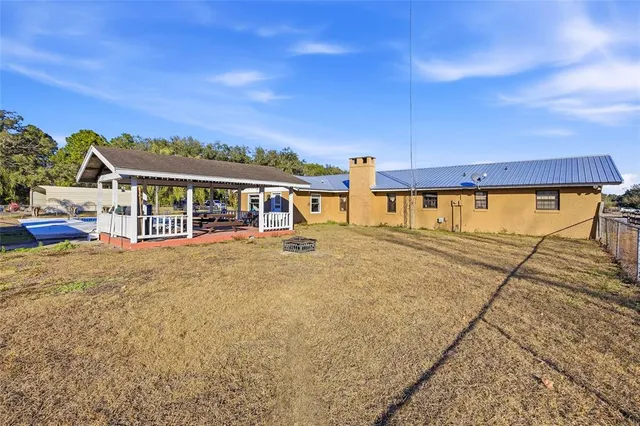 front view of a house with a big yard