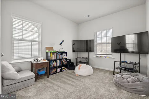 a view of a house with entertaining space