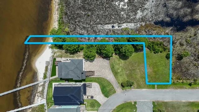 an aerial view of a house with a garden