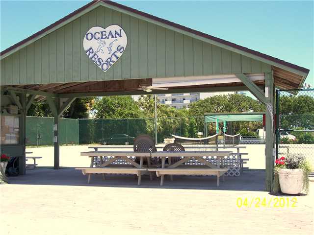 5301 Ebbtide Way Fort Pierce, FL 34949 - Photo 11 of 14 a view of a patio with a table and chairs