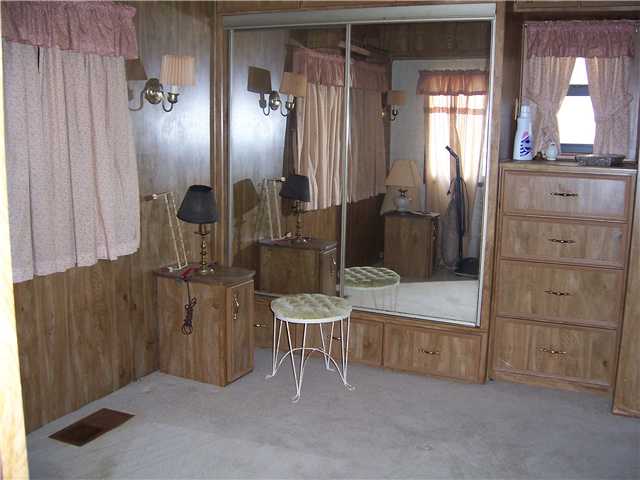 5301 Ebbtide Way Fort Pierce, FL 34949 - Photo 7 of 14 a bathroom with a sink a toilet and shower