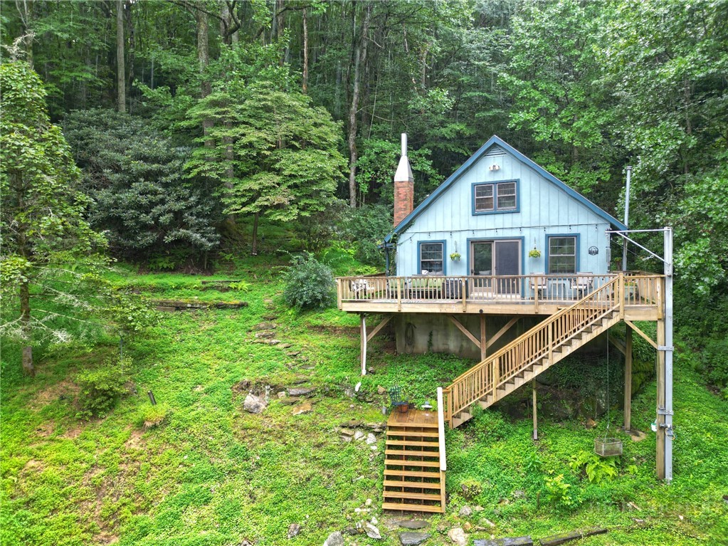 9440 Blackberry Road Lenoir, NC 28645 - Photo 25 of 30 a view of house with a yard from a swimming pool