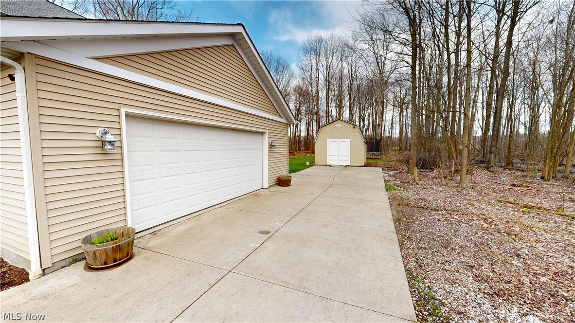 15548 Trask Road Thompson, OH 44086 - Photo 28 of 31 View of garage