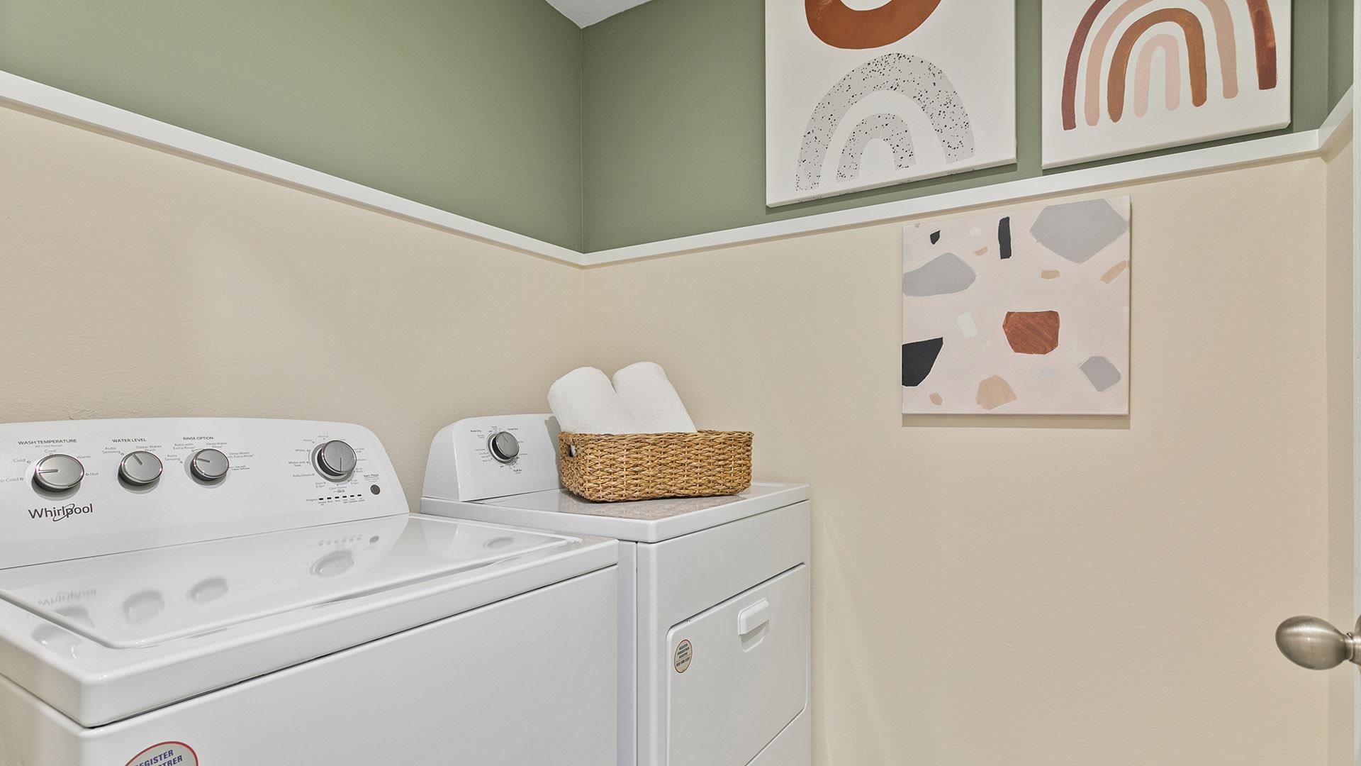 61 Redbud Road Palm Coast, FL 32137 - Photo 26 of 39 a utility room with dryer and washer