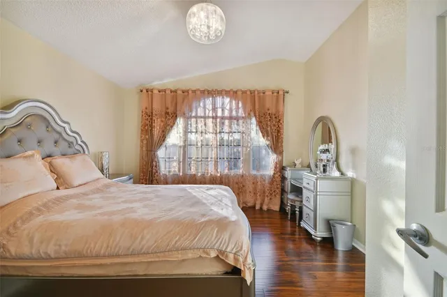a spacious bathroom with a tub shower and sink