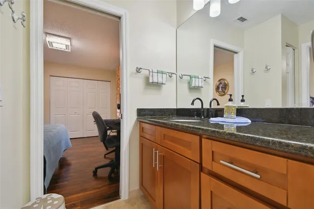 an aerial view of residential building and lake