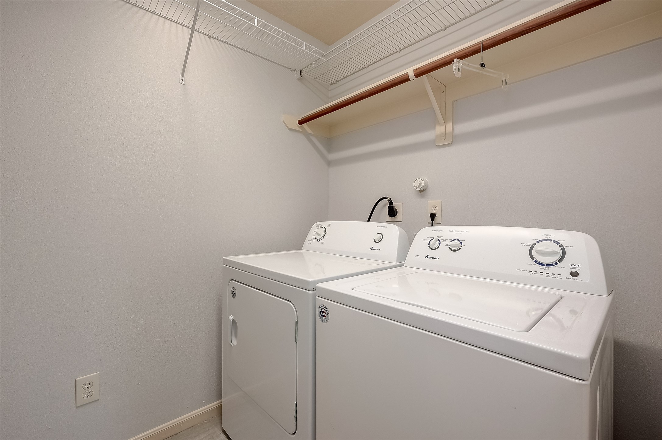 18302 North Elizabeth Shore Loop Cypress, TX 77433 - Photo 37 of 41 a utility room with dryer and washer
