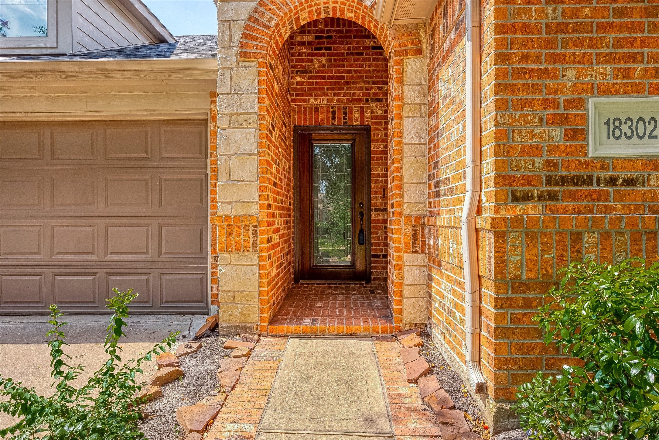18302 North Elizabeth Shore Loop Cypress, TX 77433 - Photo 4 of 41 a view of a door and a window