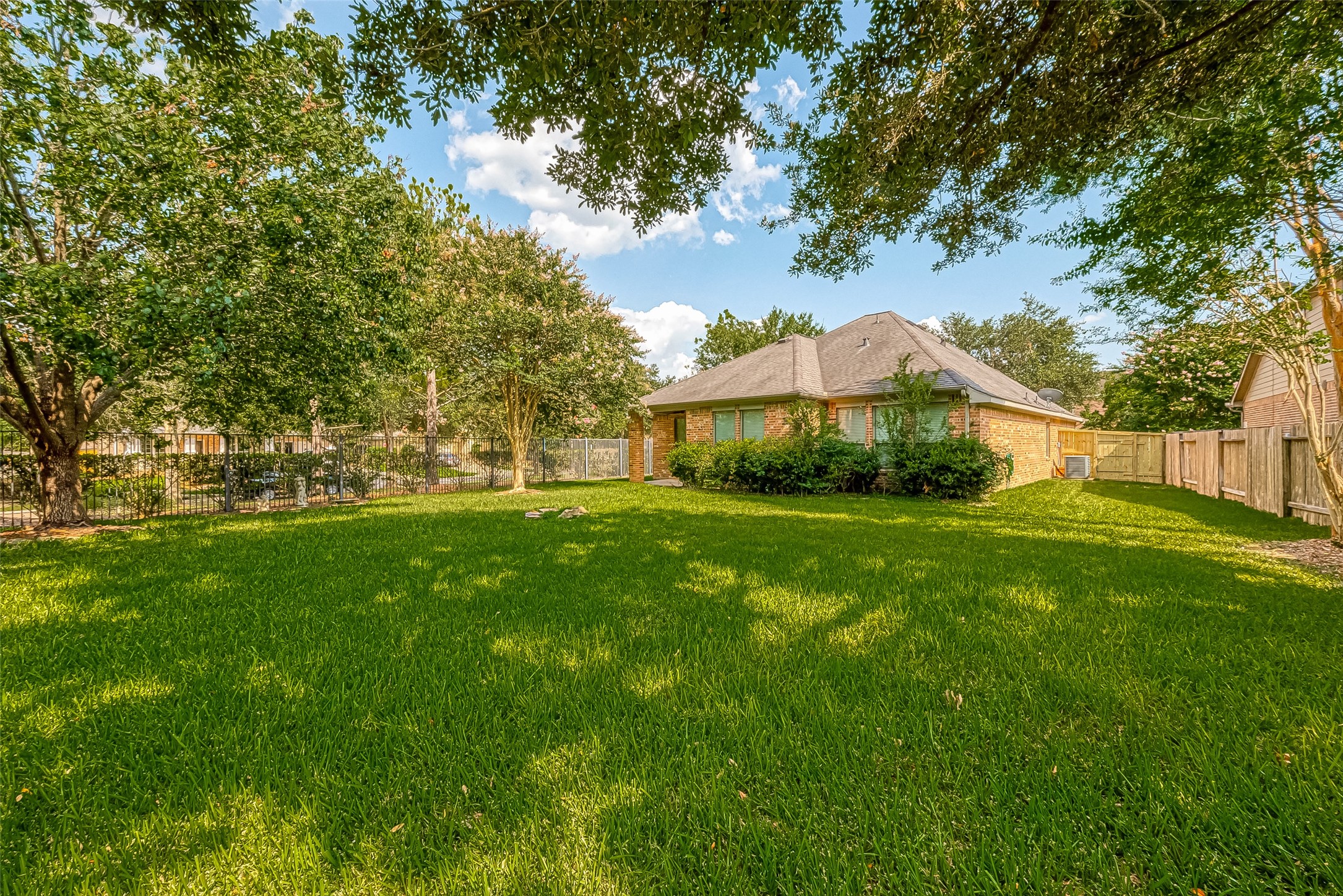 18302 North Elizabeth Shore Loop Cypress, TX 77433 - Photo 41 of 41 a front view of a house with garden
