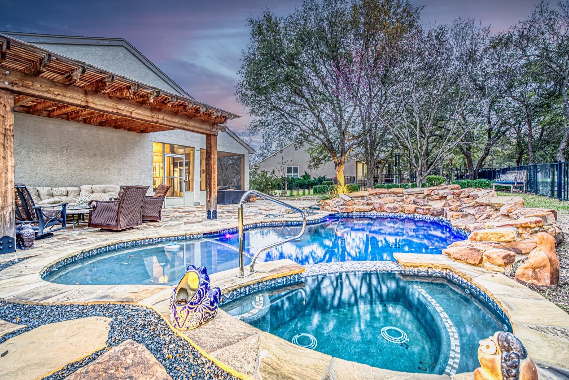 At this DeSoto plan multiple choices exist to enjoy the large fenced back yard with it's beautiful pool and spa - screened wrap-around porch, extensive open wrap-around flagstone patio or covered poolside pegola!