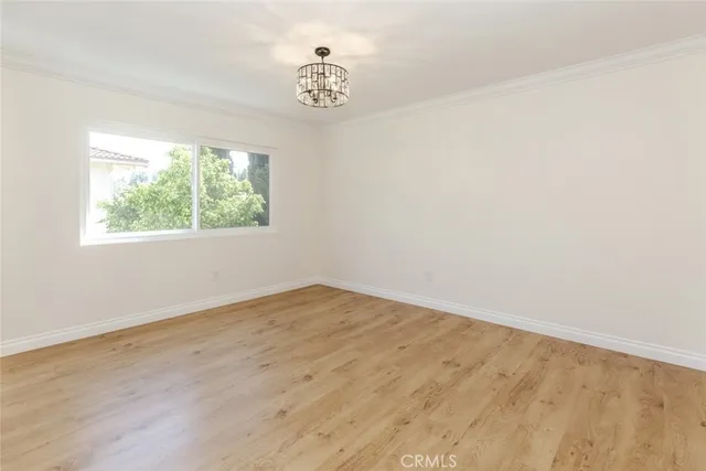 a view of a house with swimming pool and sitting area
