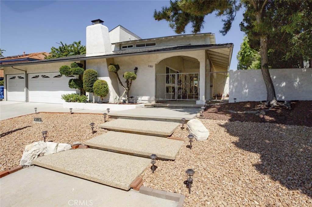 11801 Thunderbird Avenue Porter Ranch, CA 91326 - Photo 4 of 54