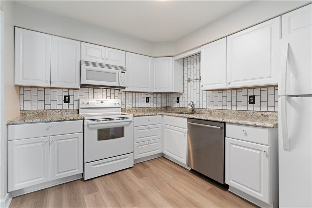 553 Sloop Road, Unit 34 Pittsburgh, PA 15237 - Photo 8 of 31 The white appliances create the clean white kitchen appearance. A newer Bosch dishwasher is an added bonus.
