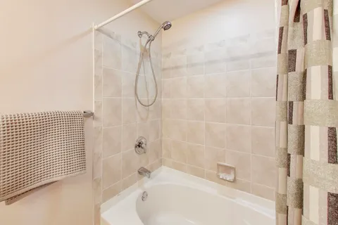 a bathroom with a bathtub