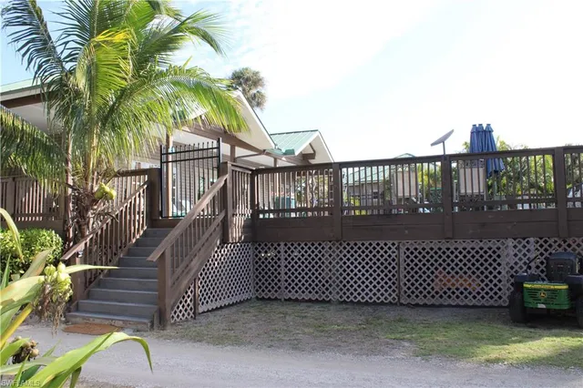 a view of a wrought iron fences in front of house