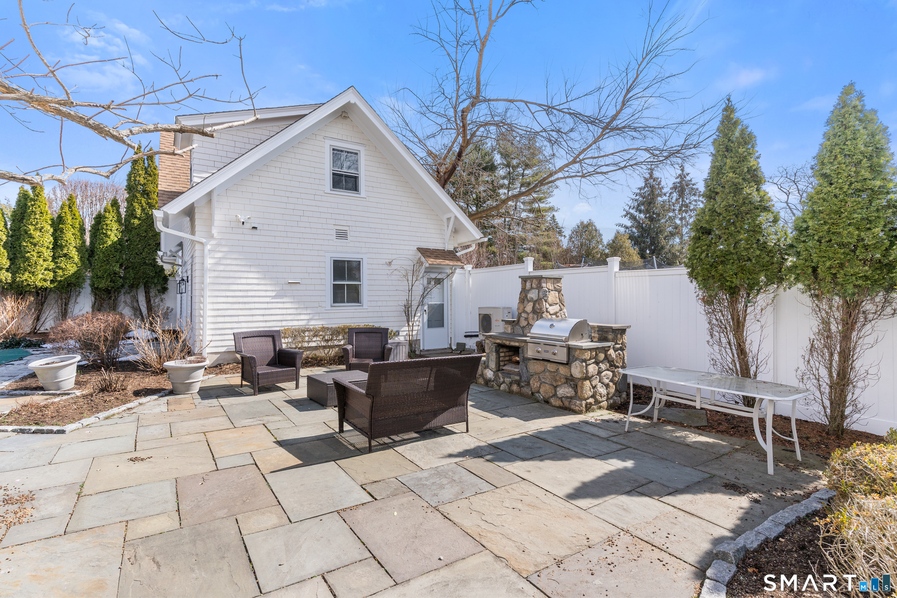 40 Rogers Road Stamford, CT 06902 - Photo 35 of 40 a view of backyard with outdoor seating