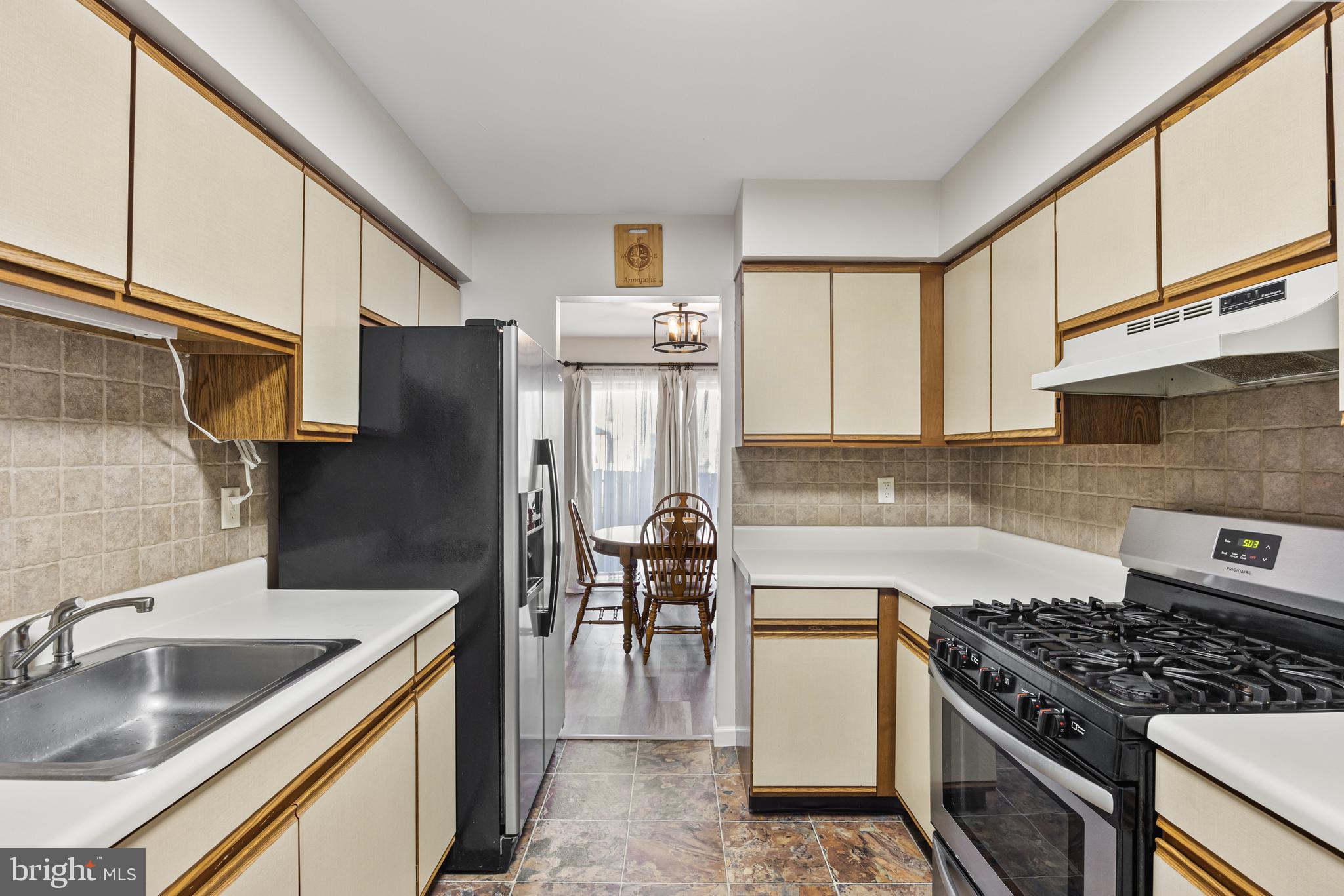 15 Ginger Drive Lumberton, NJ 08048 - Photo 13 of 30 a kitchen with a sink stove and refrigerator
