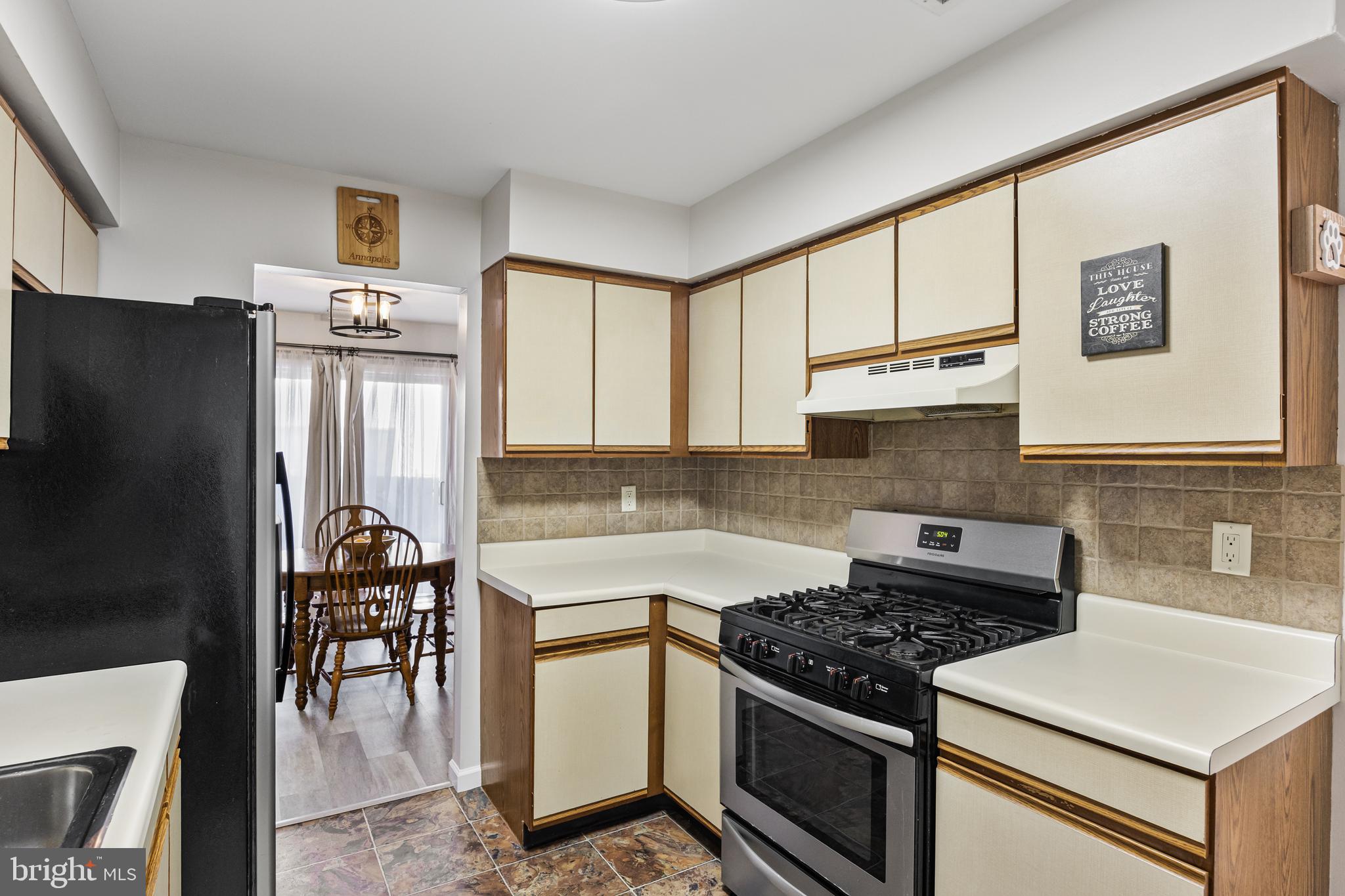 15 Ginger Drive Lumberton, NJ 08048 - Photo 14 of 30 a kitchen with stainless steel appliances granite countertop a stove a refrigerator and a stove top oven