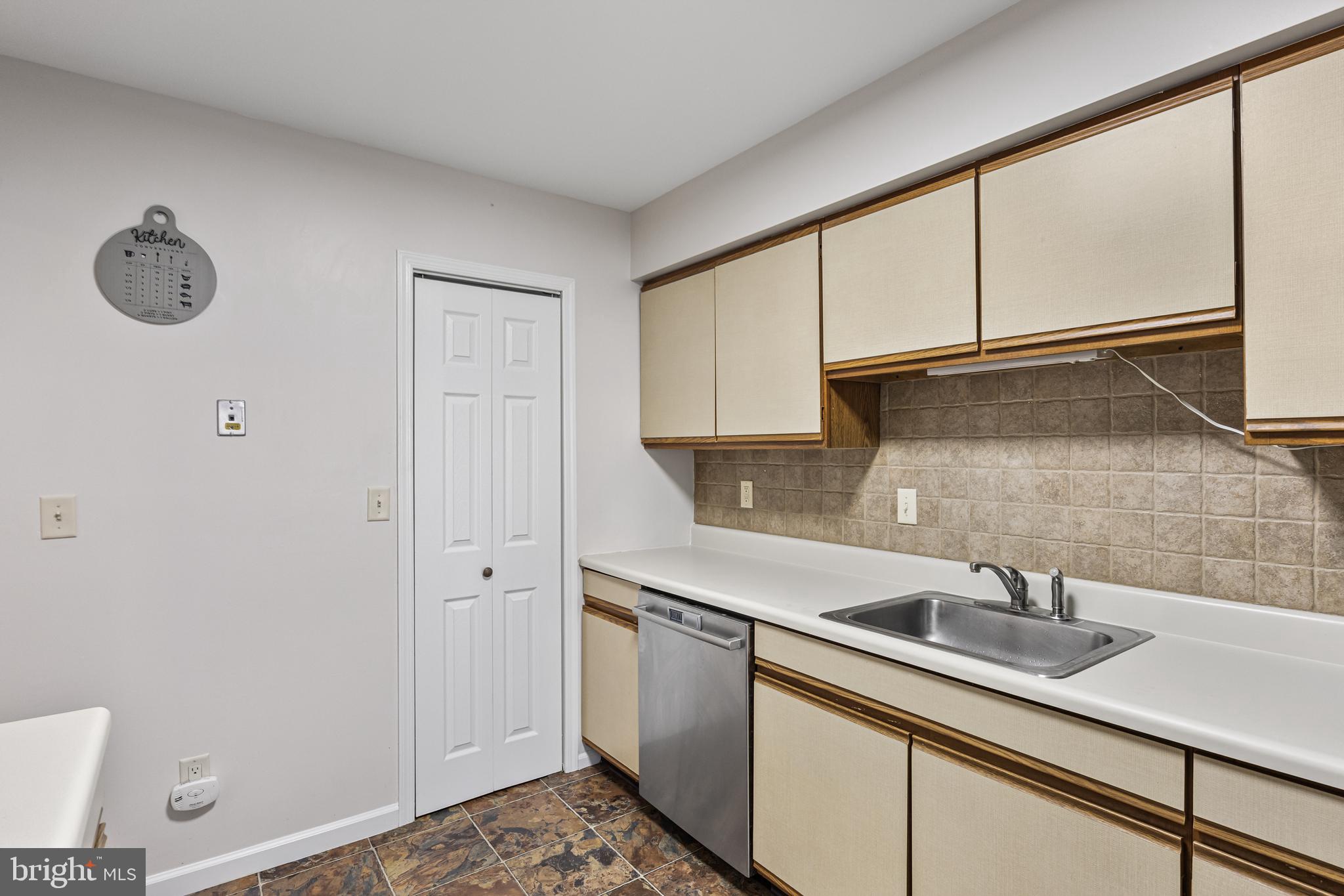 15 Ginger Drive Lumberton, NJ 08048 - Photo 17 of 30 a kitchen with stainless steel appliances granite countertop a sink and a white cabinets