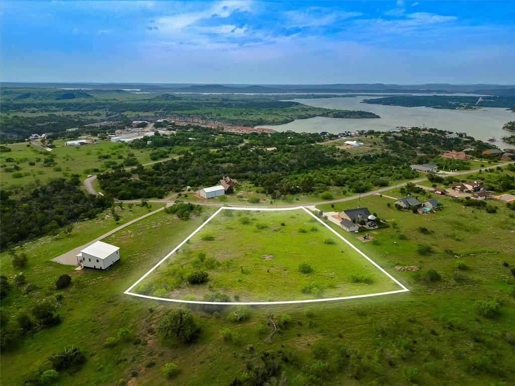 4-6 Hells Gate Loop Strawn, TX 76475 - Photo 3 of 13 a view of a swimming pool from a balcony