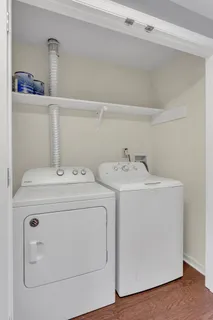 a bathroom with a sink toilet and mirror