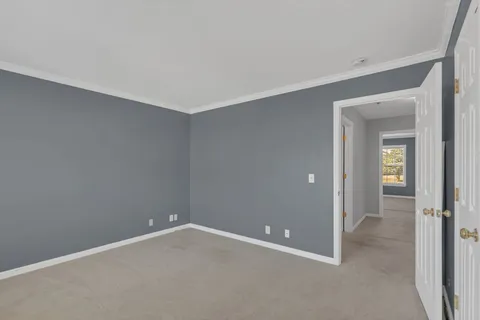 a view of a chairs and table in patio