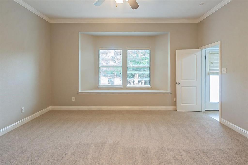 4433 Paula Ridge Court Fort Worth, TX 76137 - Photo 11 of 24 a view of an empty room with a window