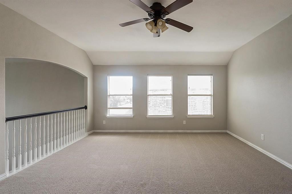 4433 Paula Ridge Court Fort Worth, TX 76137 - Photo 12 of 24 a view of an empty room with a window