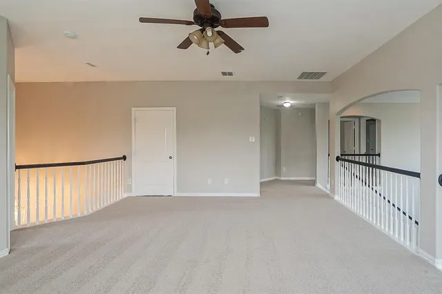 a view of a hallway with closet