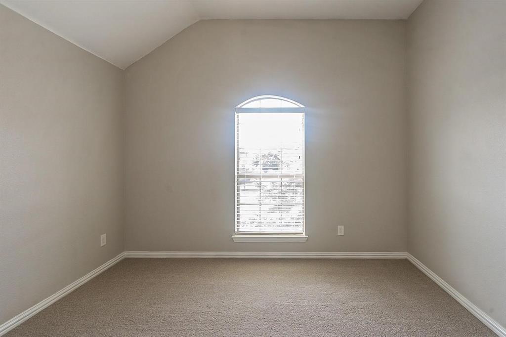 4433 Paula Ridge Court Fort Worth, TX 76137 - Photo 15 of 24 an empty room with a window
