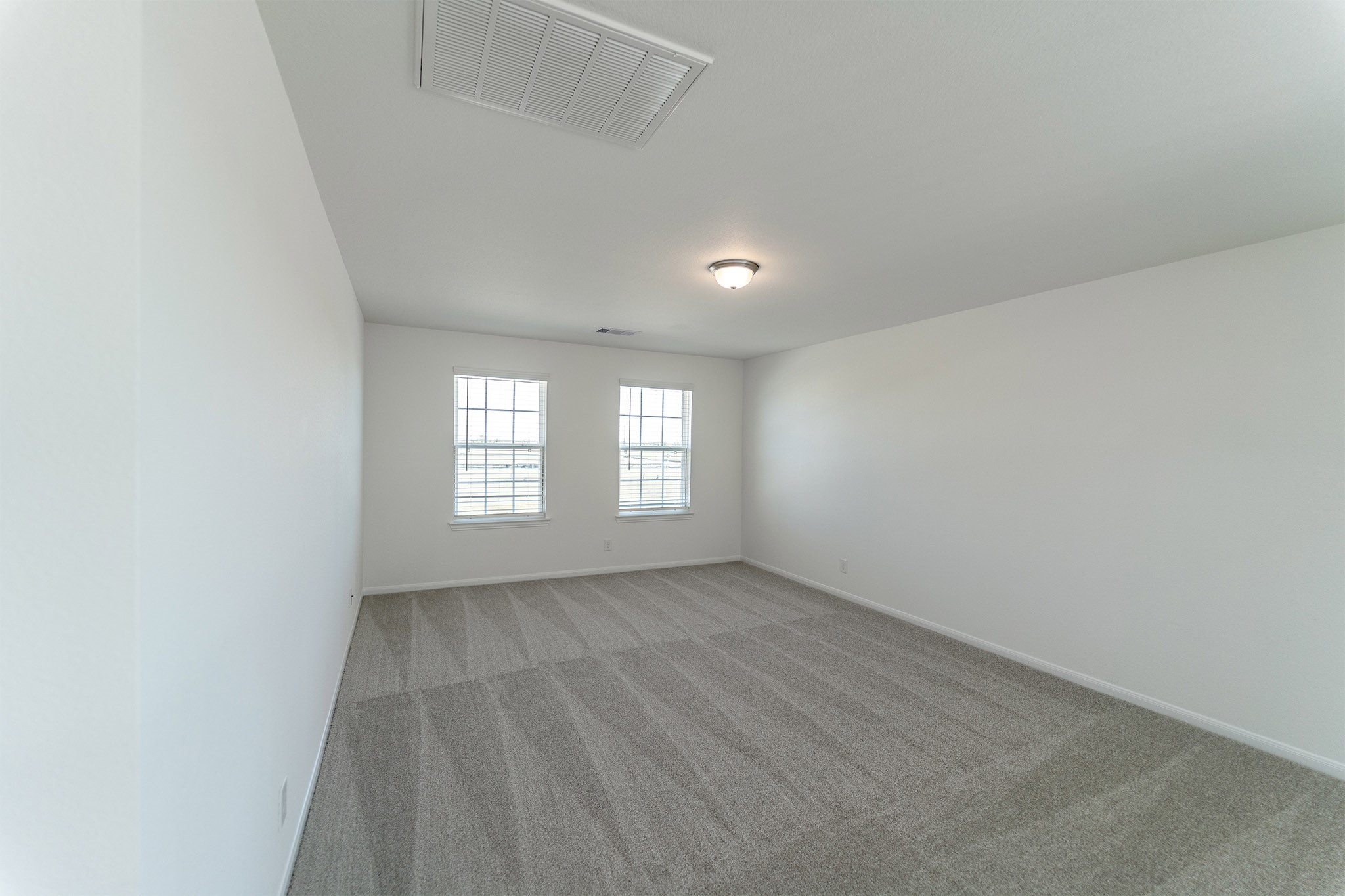 438 Hazy Meadows Drive Beasley, TX 77417 - Photo 15 of 21 an empty room with windows