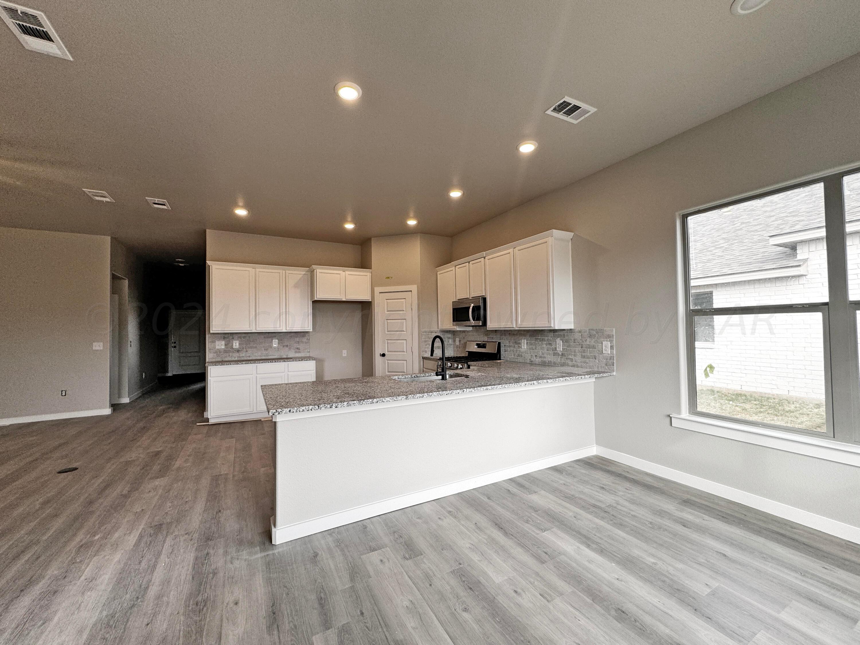 7611 Frazier Road Amarillo, TX 79119 - Photo 2 of 14 IMG_1543