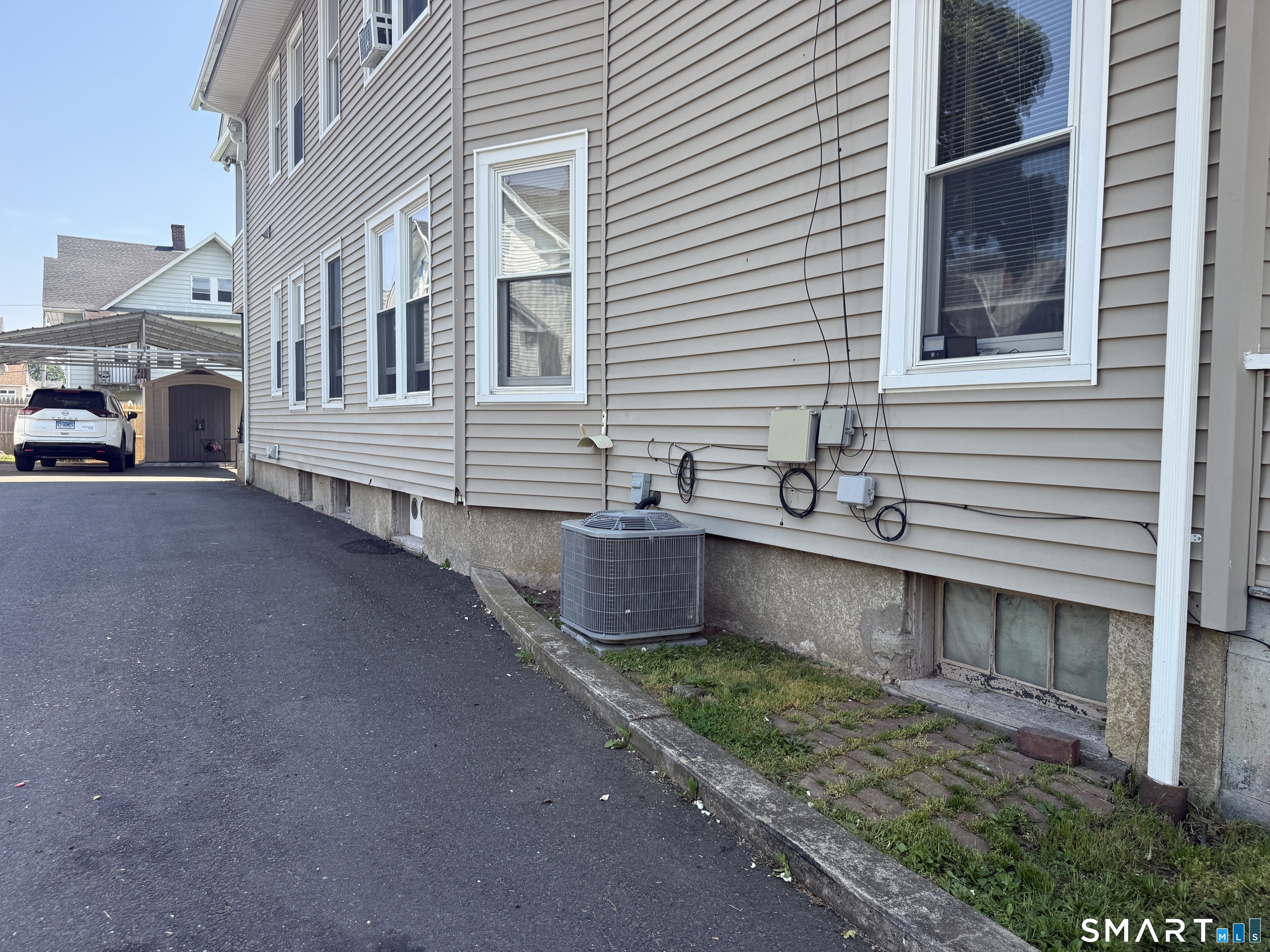 41-45 Wade Street Bridgeport, CT 06604 - Photo 2 of 40 Left Side. Central air for third floor