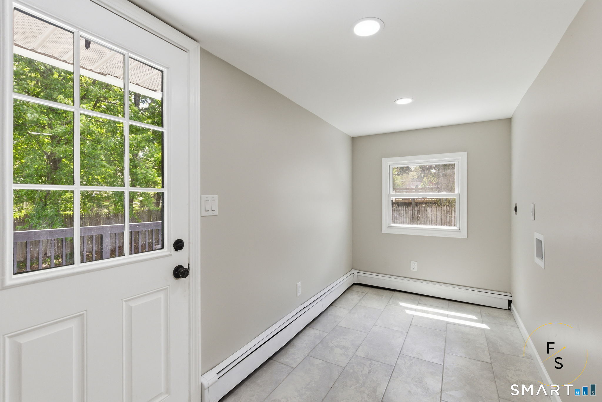 65 Broad Street Manchester, CT 06042 - Photo 11 of 40 a view of an empty room with a window