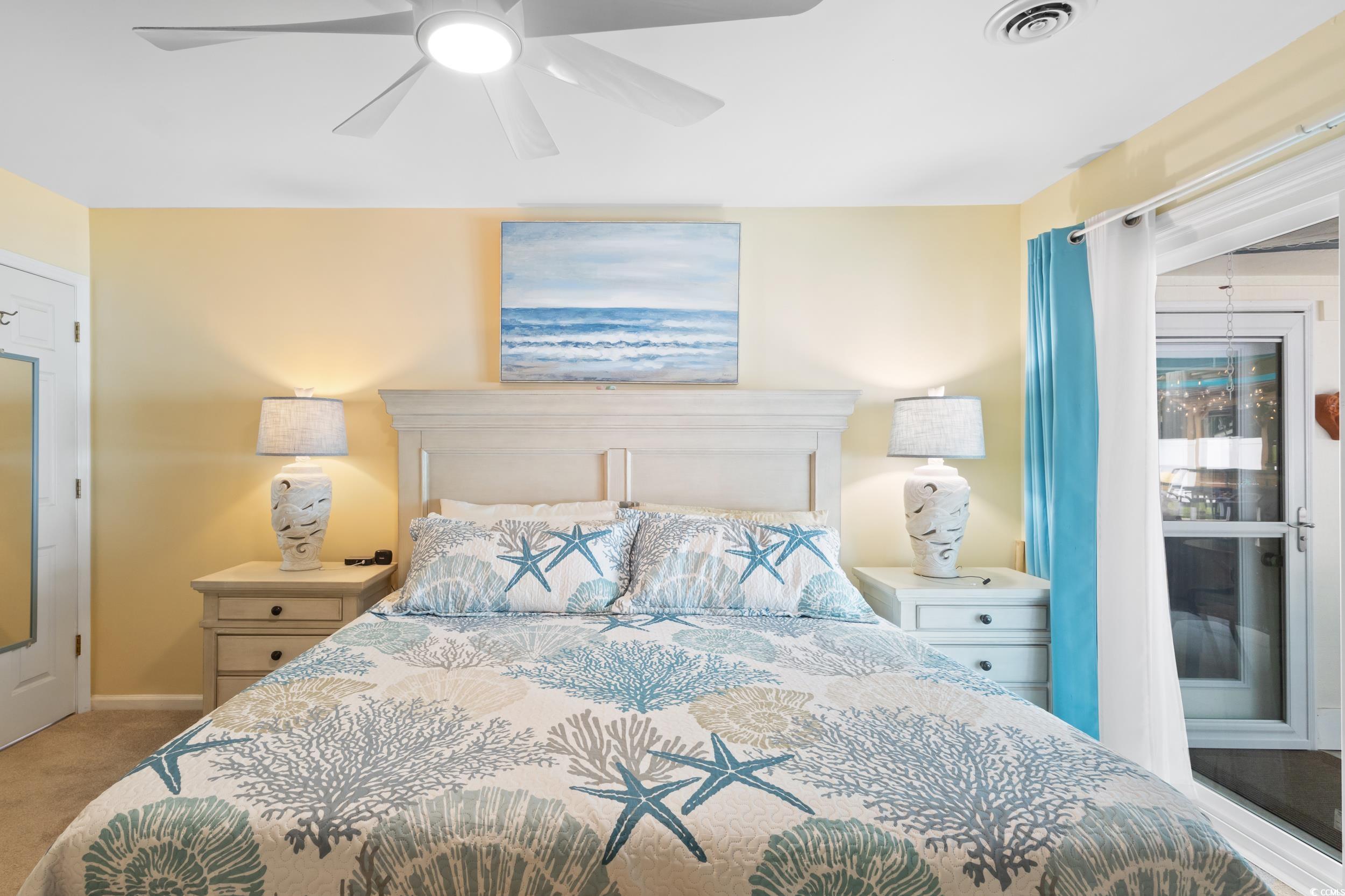815 Tillson Road North Myrtle Beach, SC 29582 - Photo 18 of 39 Carpeted bedroom with a ceiling fan and baseboards