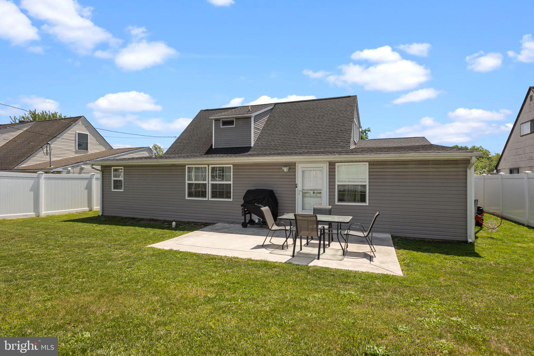 9 Verdant Road Levittown, PA 19057 - Photo 29 of 31 a front view of house with yard and seating area