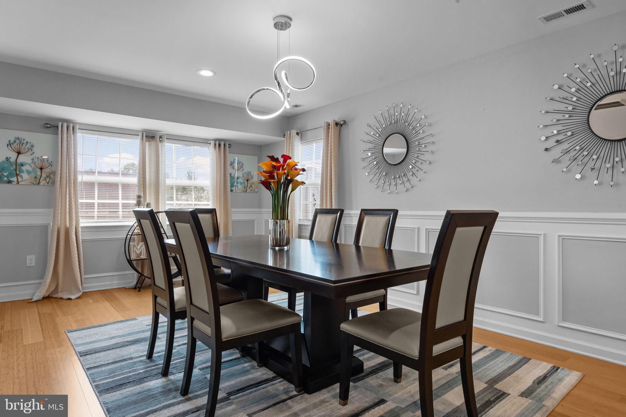 9 Verdant Road Levittown, PA 19057 - Photo 3 of 31 a view of a dining room with furniture and wooden floor