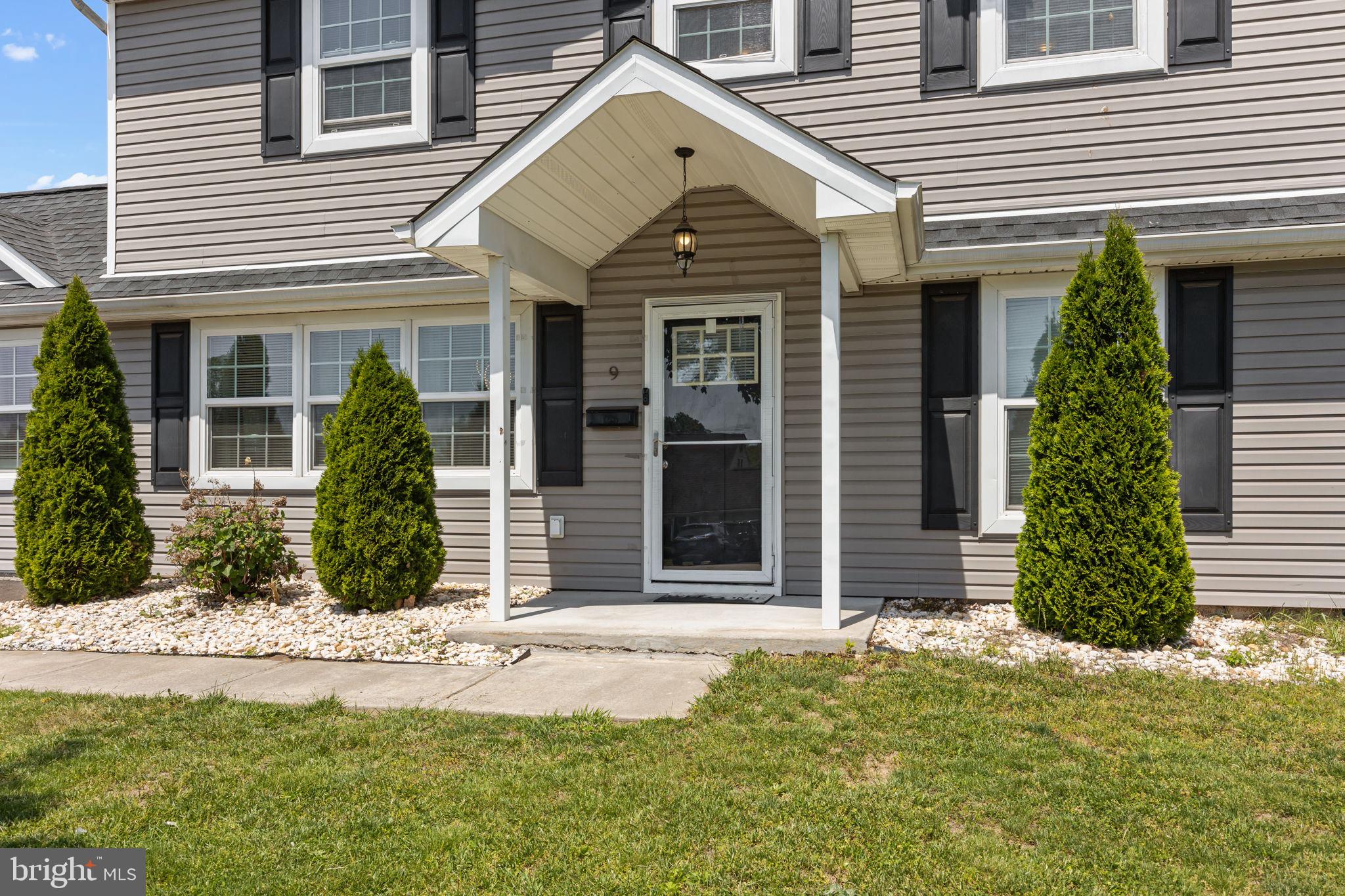 9 Verdant Road Levittown, PA 19057 - Photo 7 of 31 a front view of a house with a yard