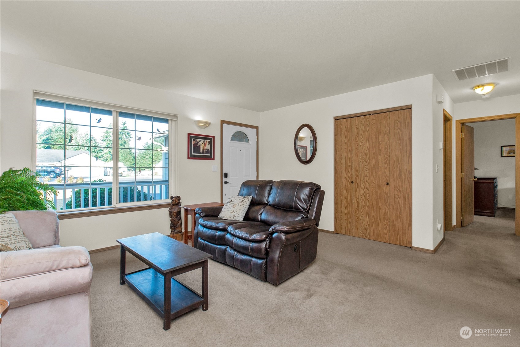 17406 Privet Court Southwest Rochester, WA 98579 - Photo 13 of 34 a living room with furniture and windows