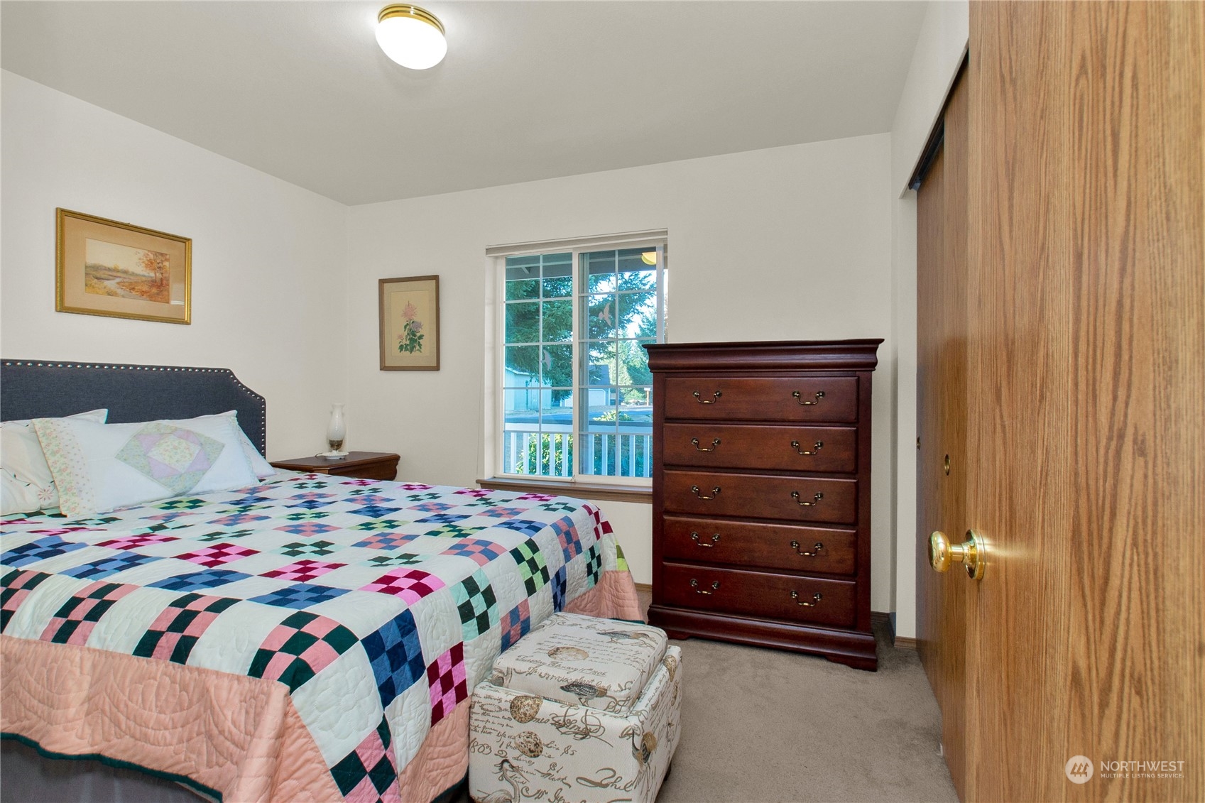 17406 Privet Court Southwest Rochester, WA 98579 - Photo 15 of 34 a bedroom with a bed and a dresser