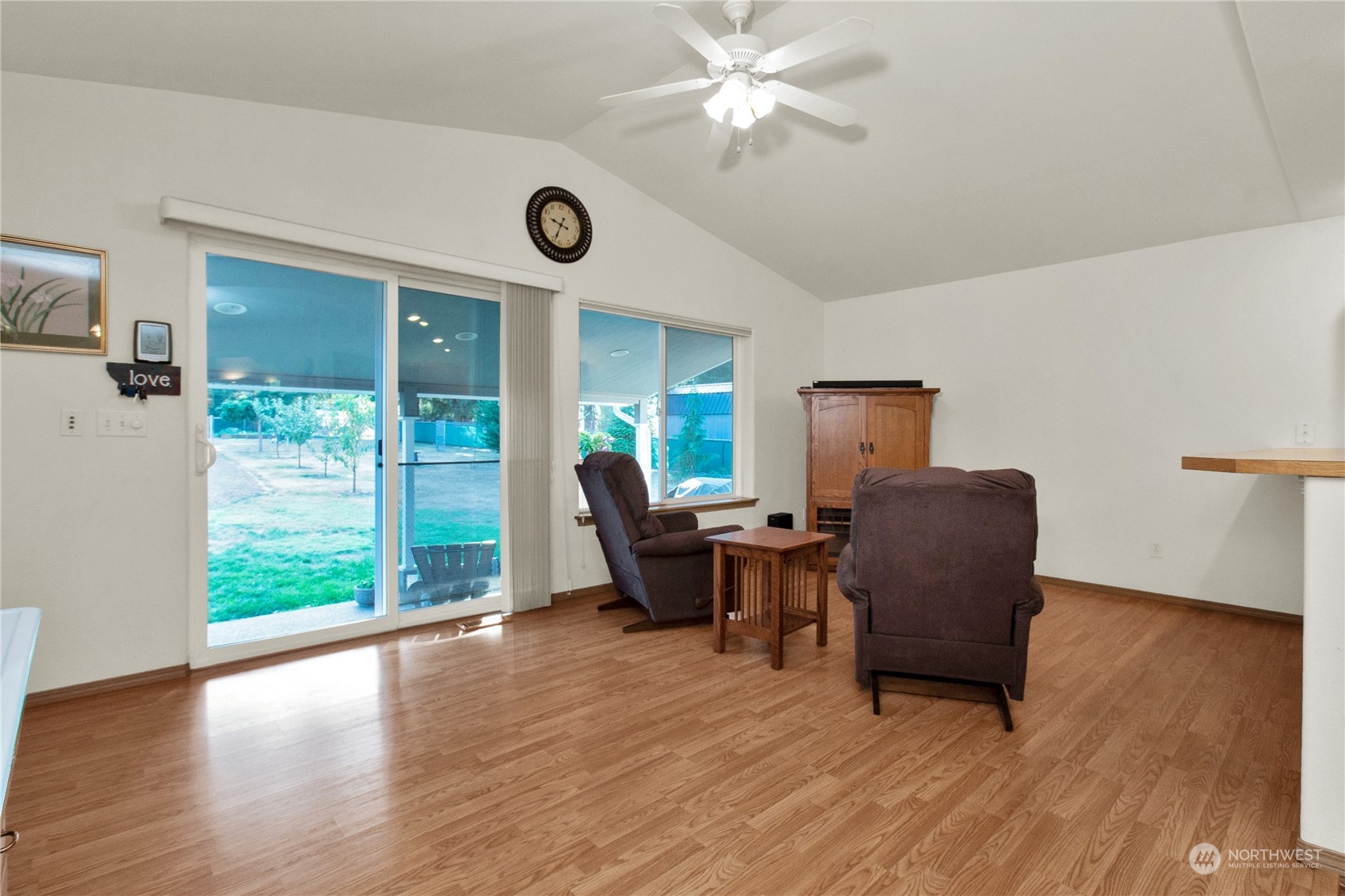 17406 Privet Court Southwest Rochester, WA 98579 - Photo 26 of 34 a living room with furniture and a large window