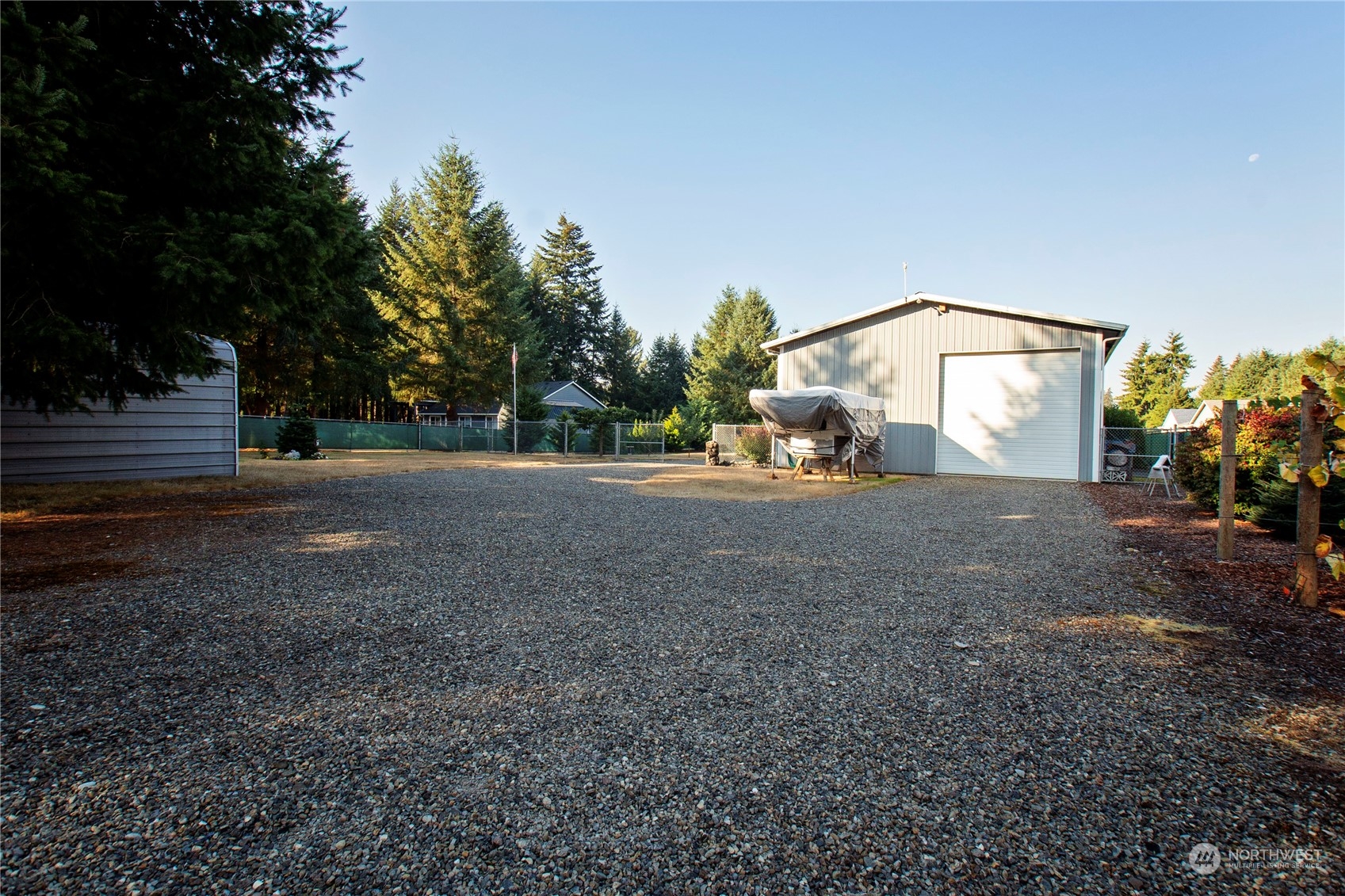 17406 Privet Court Southwest Rochester, WA 98579 - Photo 5 of 34 a view of a big yard with large trees